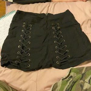 Black lace up skirt.